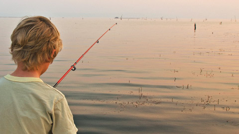 Kids Catch Lifelong Memories. little boy fishing on boat