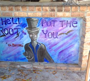 Whimsical Art of Daufuskie Island. A painting of a man in a black hat